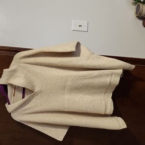 Cream colored hooded poncho